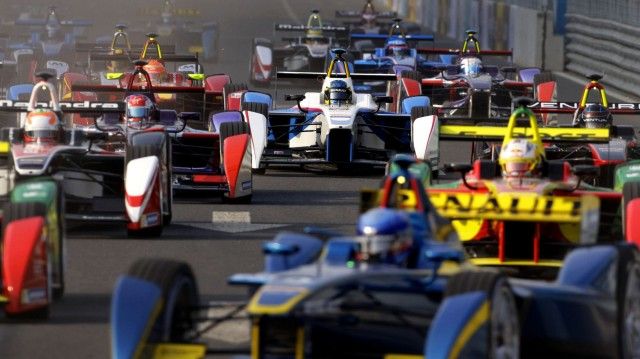 Formula E cars drive into a corner during the Formula E Championship race in Beijing