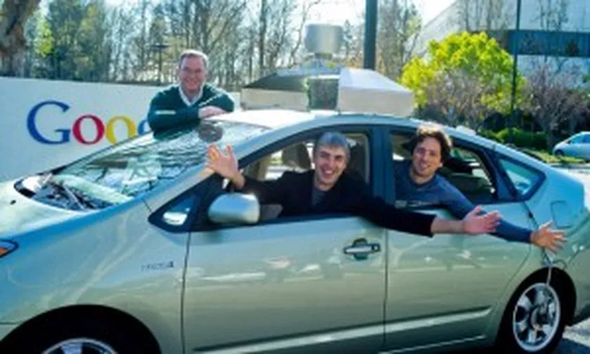 the-founders-of-google-and-one-of-their-autonomous-toyota-prius-hybrids_100389905_m