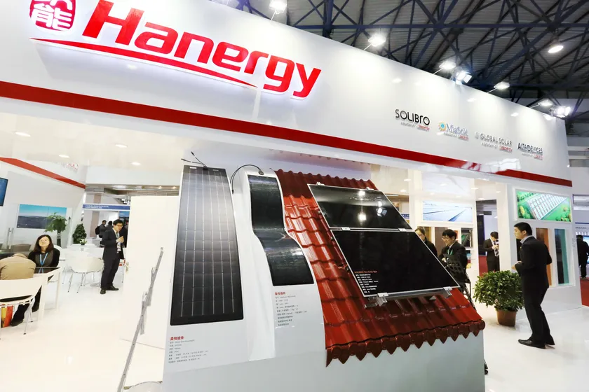 --FILE--People visit the stand of Hanergy during an exhibition in Beijing, China, 1 April 2015. Hanergy Group founder Li Hejun has raised his holding in the companys Hong Kong-listed solar business, signalling confidence in its prospects even after a 180 per cent share price rise this year  and netting a $4.8m paper profit in less than a week. Hong Kong-listed Hanergy Thin Film has come under scrutiny in recent months because of its soaring share price and the high level of sales it makes to its own parent company. Shares in HTF have climbed 350 per cent in six months, making the solar equipment supplier the best performer in Hong Kongs Hang Seng Composite index. But, in the past week, Mr Li has spent HK$264m ($33.9m) buying more HTF shares at between HK$6.9 and HK$6.92, according to regulatory filings with the Hong Kong Stock Exchange. On Thursday (23 April 2015), shares in HTF, which had traded tightly between HK$6.9 and HK$6.93 since April 16, jumped 14.2 per cent to close at HK$7.88, giving Mr Li a $4.8m paper profit on his latest investments in the company. In another filing on Thursday, made at the request of the stock exchange, HTF said it knew of no reason for Thursdays increased price and trading volume, nor of any information that should be disclosed to the market.